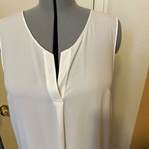 White sleeveless blouse